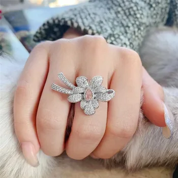 Бижута, диамантен пръстен с лък и цвете, жена открывающееся пръстен върху показалеца си, Жокера